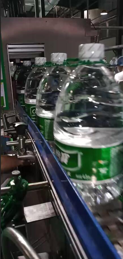 Video of 4.5L water handle filling line at Yibao Water Plant